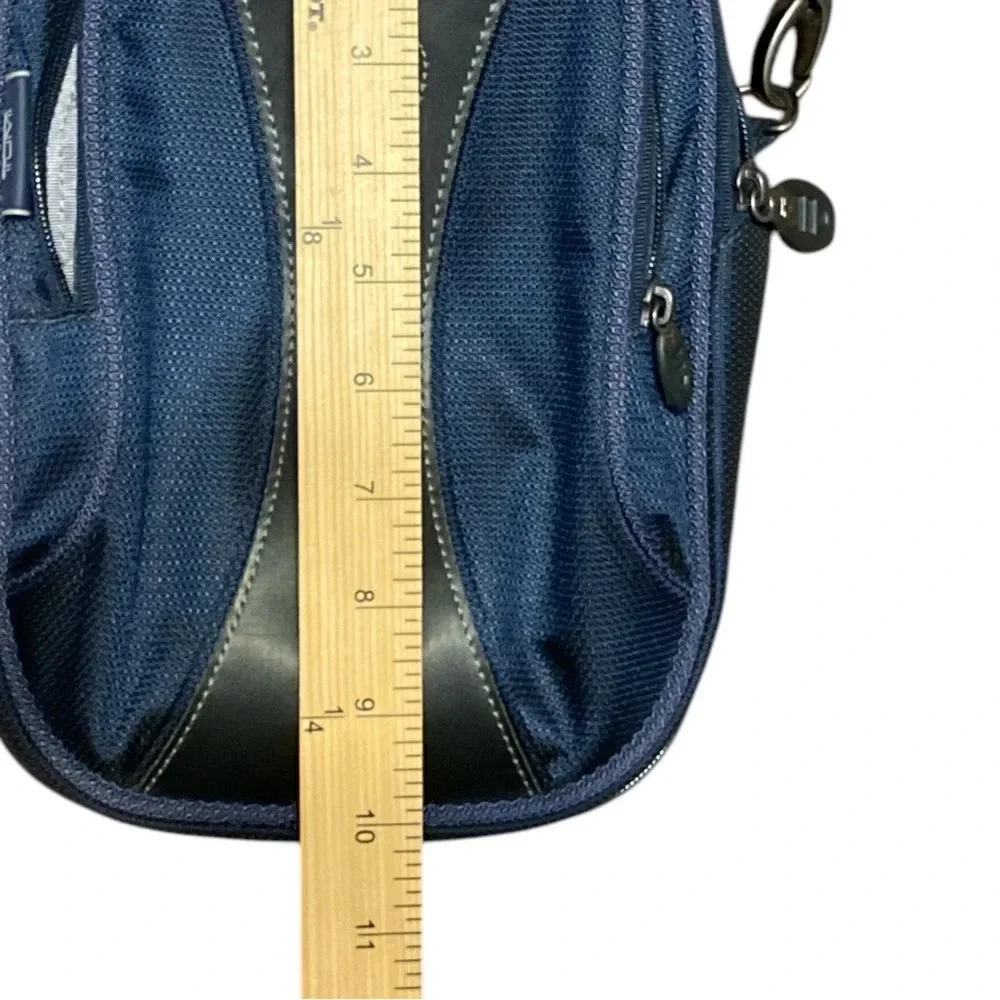 TUMI Tech crossbody navy blue like new condition